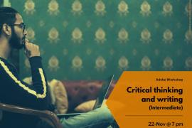 A masculine figure sat pondering with his laptop