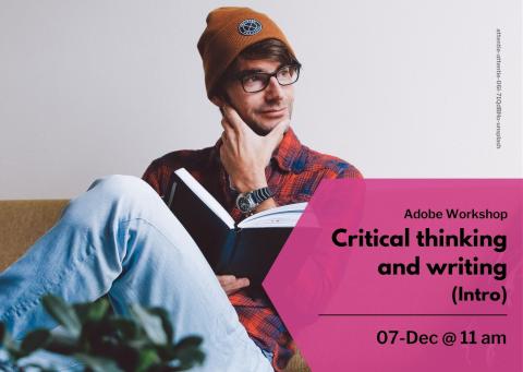 Man looking calm, rubbing his chin in a beanie hat, with a book