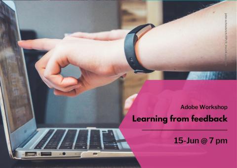 People pointing at a computer screen